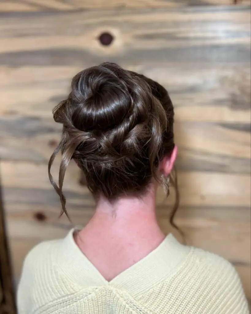Beautiful-Rose-bun-updo-with-a-French-braid