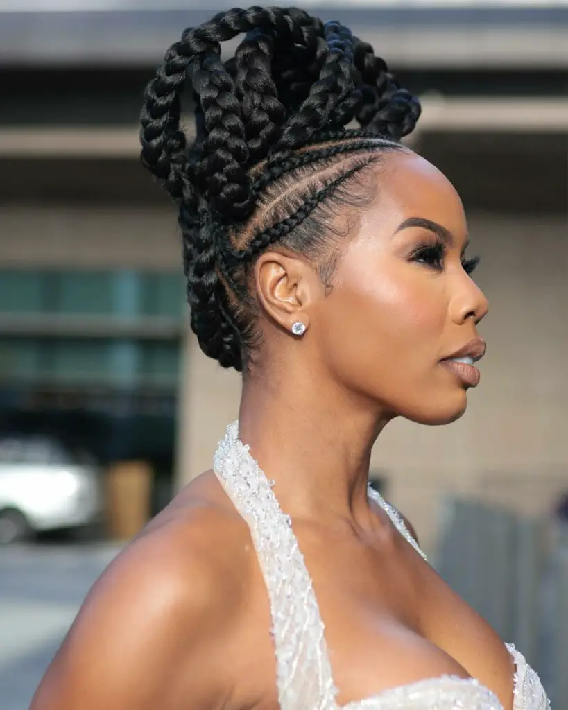 Detailed cornrows top bun rope-like twist hairstyle for for special event