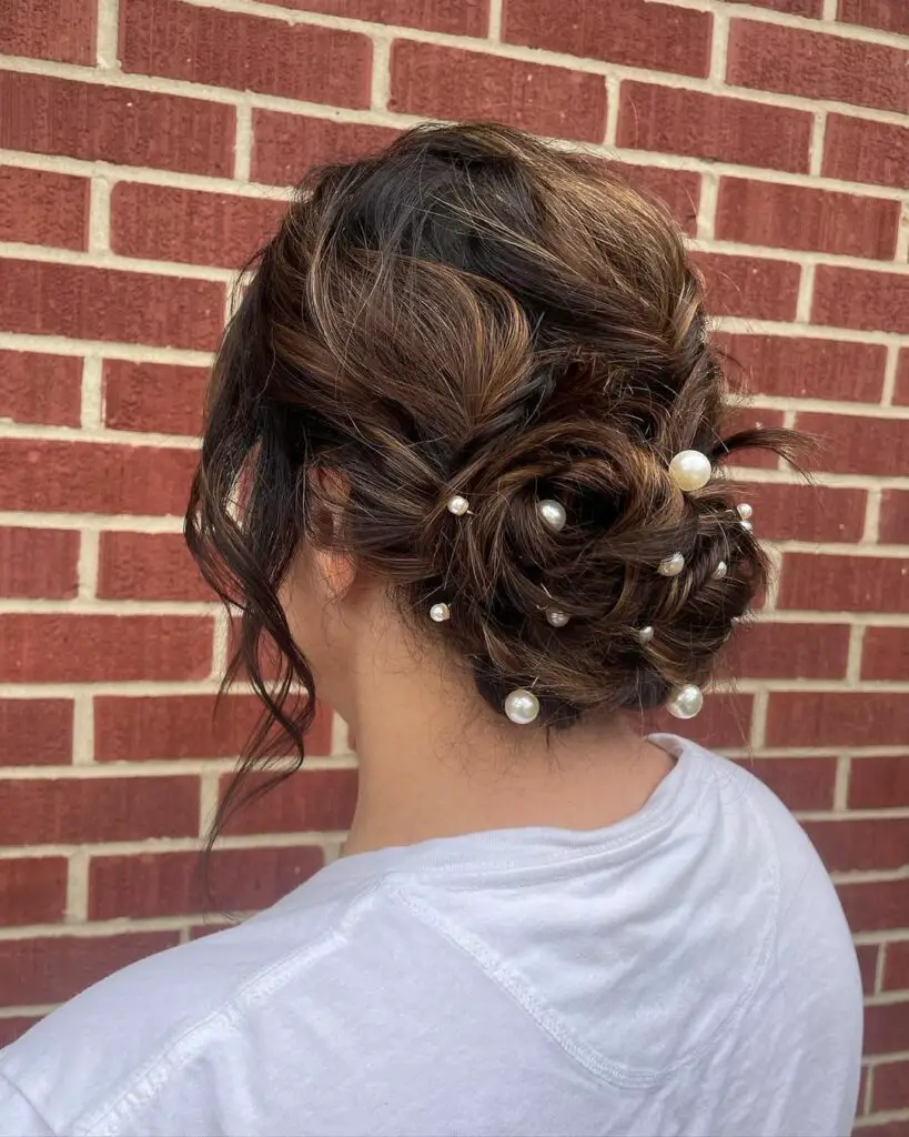 Messy Bun with Purls and Curls for prom dance