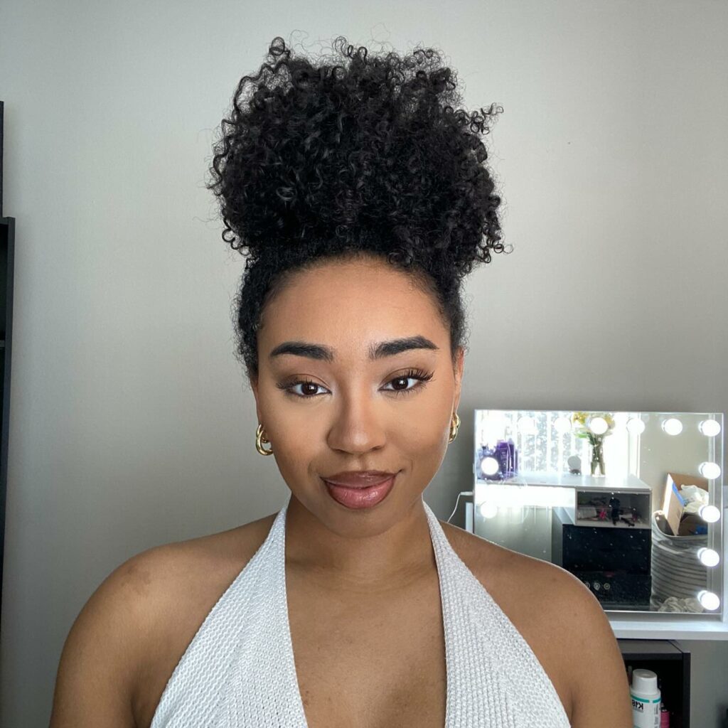 High puff with tight curls for summer hairstyles for curly hair