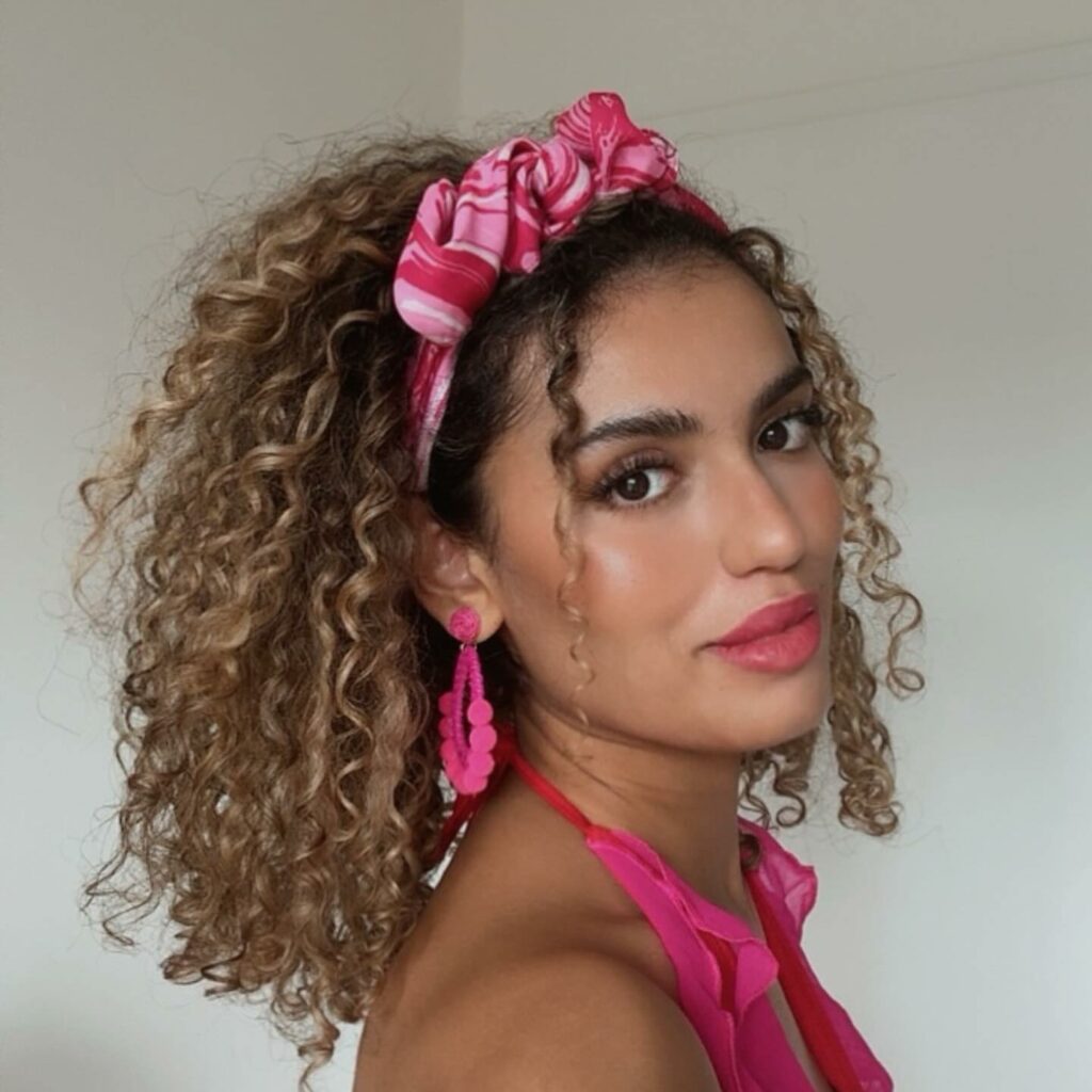 half-up, half-down curly hairstyle for summer