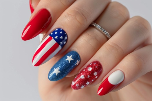 almond-shaped nails with an American flag accent design
