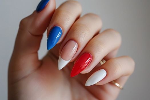 almond-shaped nails with red white and blue French tips
