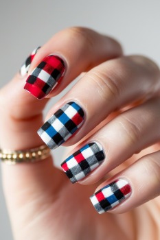 square nails with a red white and blue plaid design