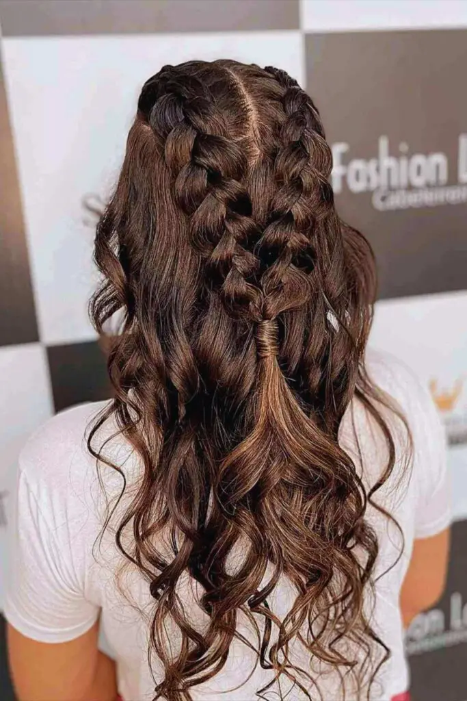 Trendy double braids flowing into a half-up style, ideal for adding dimension and a bohemian touch to long hair.