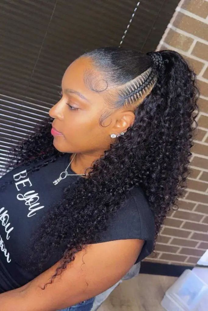 A beautifully detailed half-up braided ponytail with curly ends, balancing structure with softness for a stylish finish.